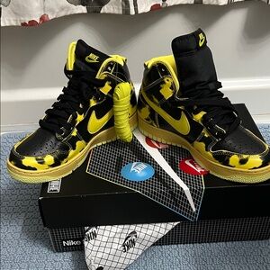 Nike Black and Yellow High-Tops